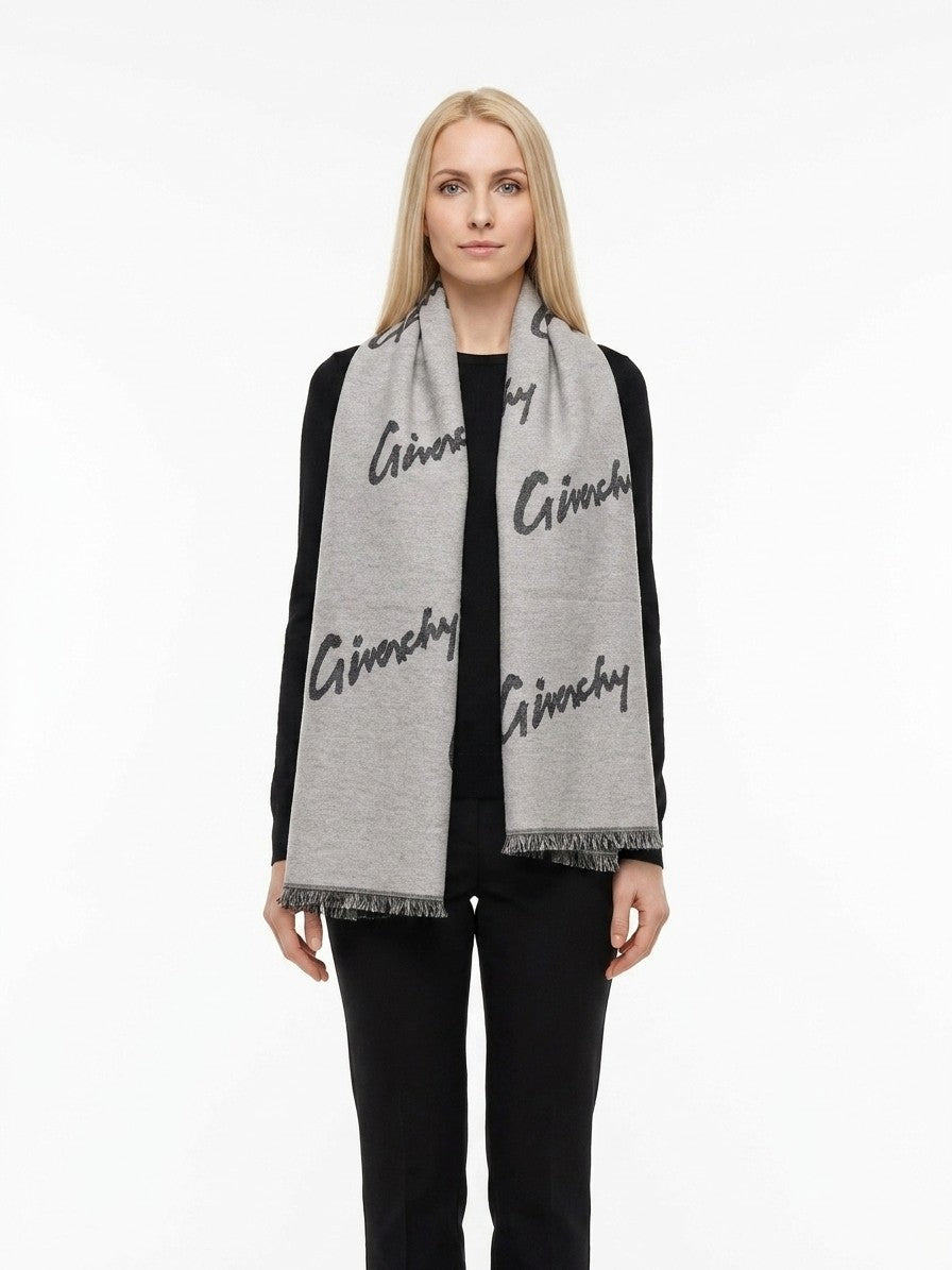 Scarf by Givenchy for women in wool & silk bicolour showcases a eye catching silhouette, artfully capturing the essence of the eye catching Wool & Silk Wrap Scarf design for a sophisticated look.