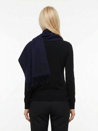 Scarf by Givenchy for women in wool bicolour showcases a warm silhouette from the Wool Scarf collection, offering a warm drape that exudes sophisticated luxury.