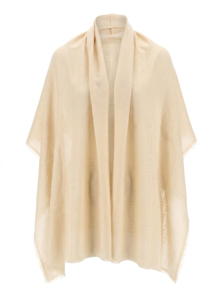 Scarf by Givenchy for women in wool & silk beige features a timeless silhouette, artfully capturing the essence of the timeless The Blend Wool & Silk Square Scarf design for a sophisticated look.
