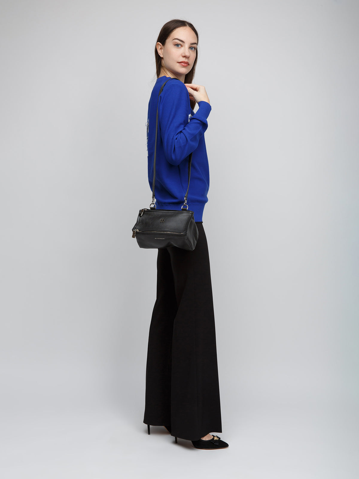 Handbag by Givenchy for women in calfskin leather gray features an refined silhouette, showcasing a secure , ample , and versatile for a sophisticated refined aesthetic.