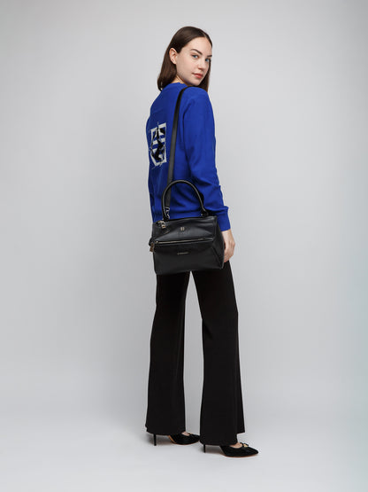 Handbag by Givenchy for women in calfskin leather black features a contemporary silhouette, showcasing a secure , ample , and contemporary for a sophisticated look.