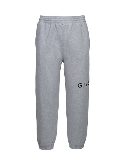 Joggers by Givenchy for men in cotton gray features a refined silhouette with a refined slim, defined by a and a refined long for a refined finish.