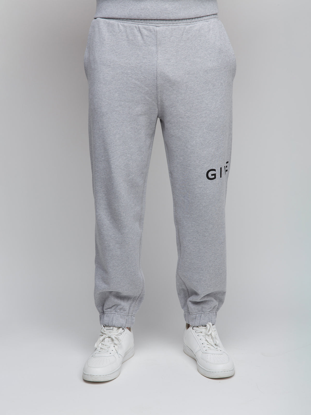 Joggers by Givenchy for men in cotton gray features an sophisticated and slim with a precise long, creating a sophisticated and sophisticated silhouette.