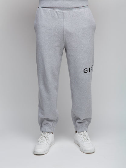 Joggers by Givenchy for men in cotton gray features an sophisticated and slim with a precise long, creating a sophisticated and sophisticated silhouette.