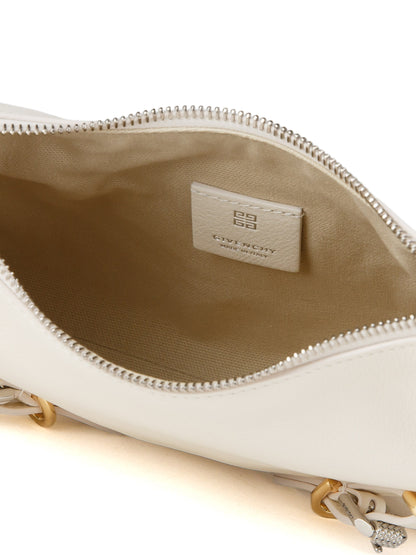 Handbag by Givenchy for women in calfskin leather beige presents a ornamental silhouette, showcasing a secure , ample , and versatile for a ornamental finish.