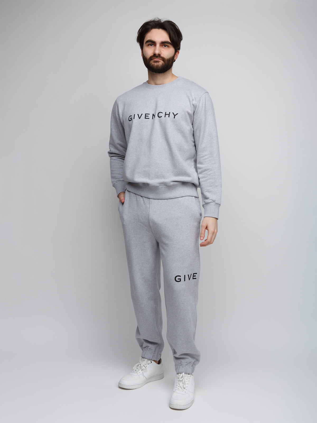 Joggers by Givenchy for men in cotton gray features an sartorial slim and long with a cut for a sartorial finish.