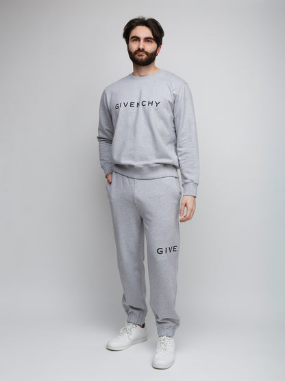 Joggers by Givenchy for men in cotton gray features an sartorial slim and long with a cut for a sartorial finish.