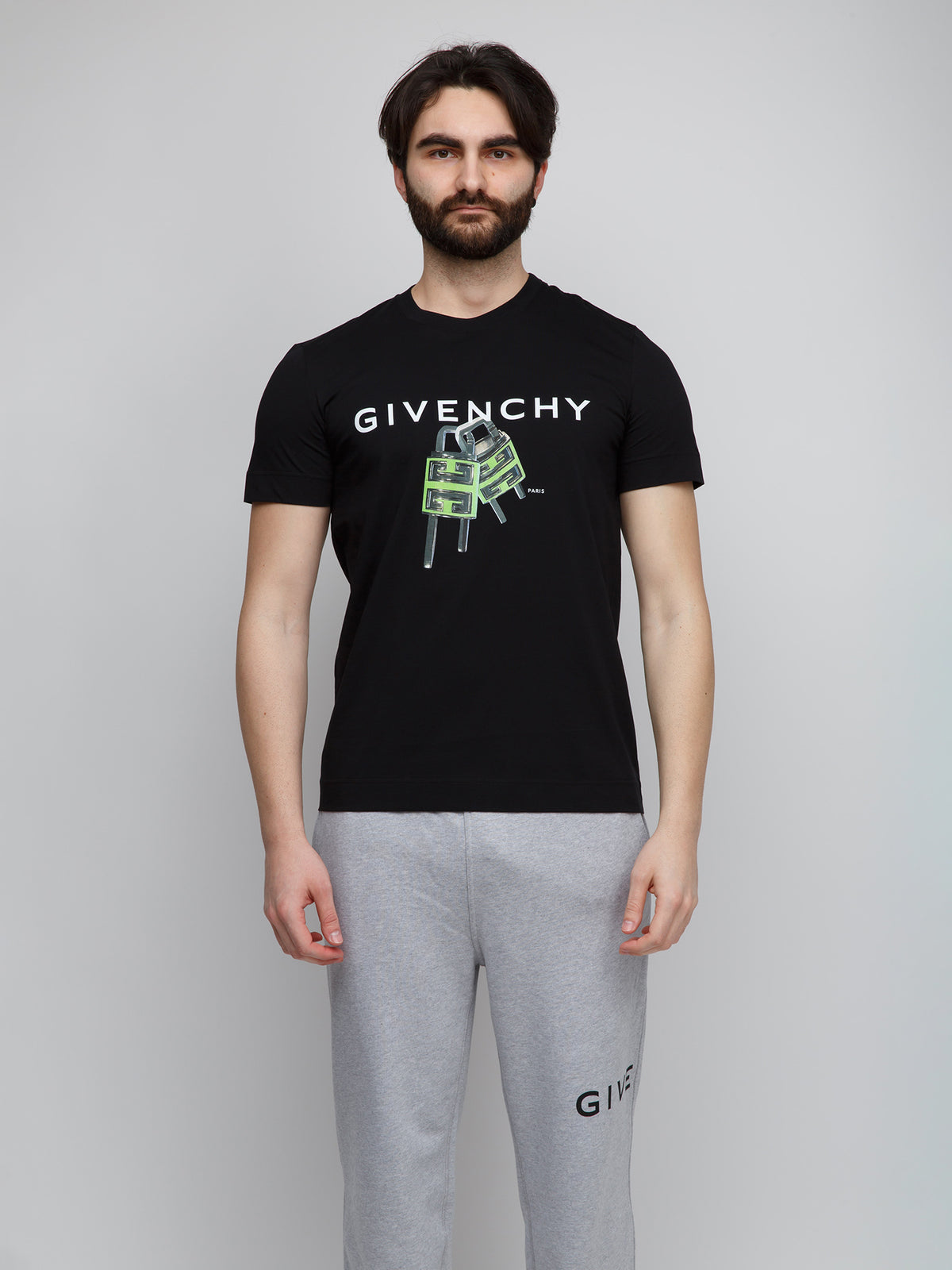 T-Shirt by Givenchy for men in cotton black showcases a dramatic silhouette, elegantly detailed with a dramatic and for a truly dramatic finish.