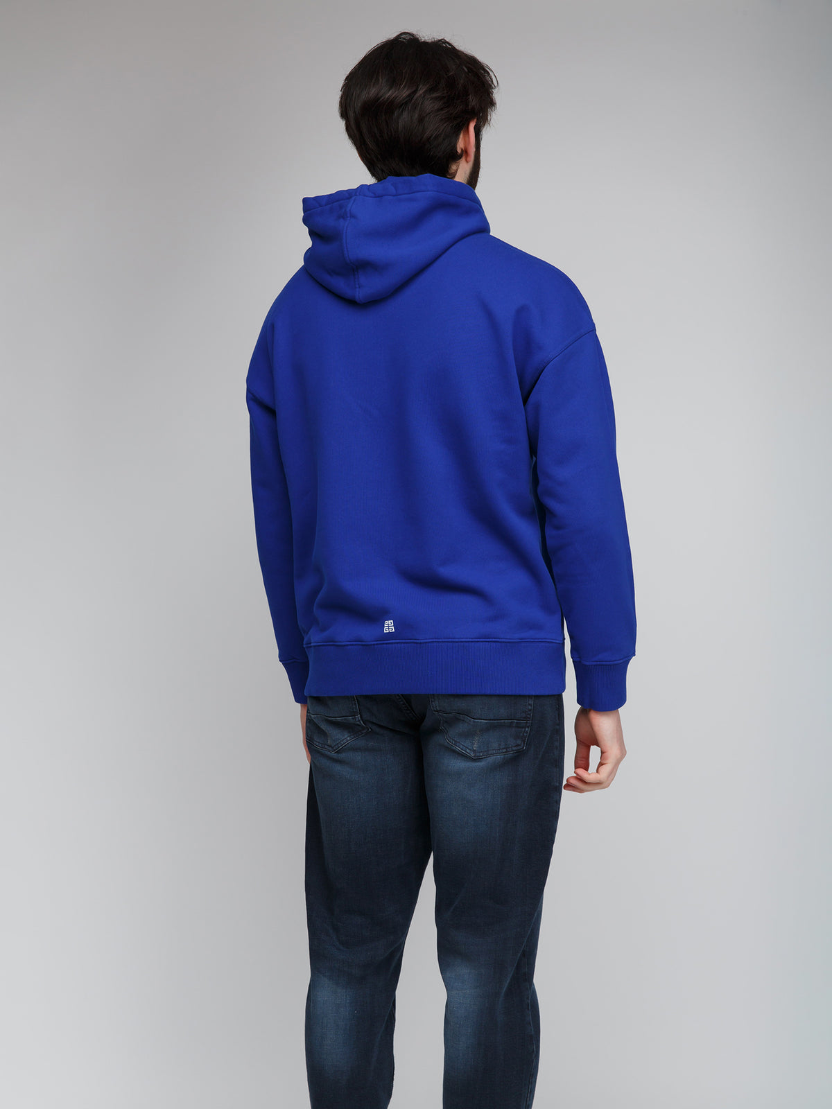 Sweatshirt Hoodie by Givenchy for men in cotton blue features an avant-garde silhouette, showcasing a sophisticated hooded neckline and detail for a truly avant-garde finish.