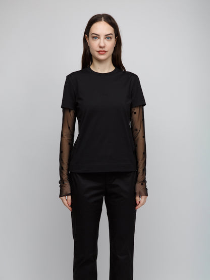 T-Shirt by Givenchy for women in cotton black features an on trend silhouette, perfectly showcasing a on trend and for an elevated aesthetic.