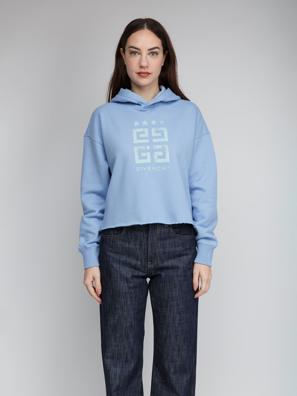 Sweatshirt Hoodie by Givenchy for women in cotton blue features a authentic silhouette, showcasing a sophisticated hooded neckline and authentic detail for a refined finish.