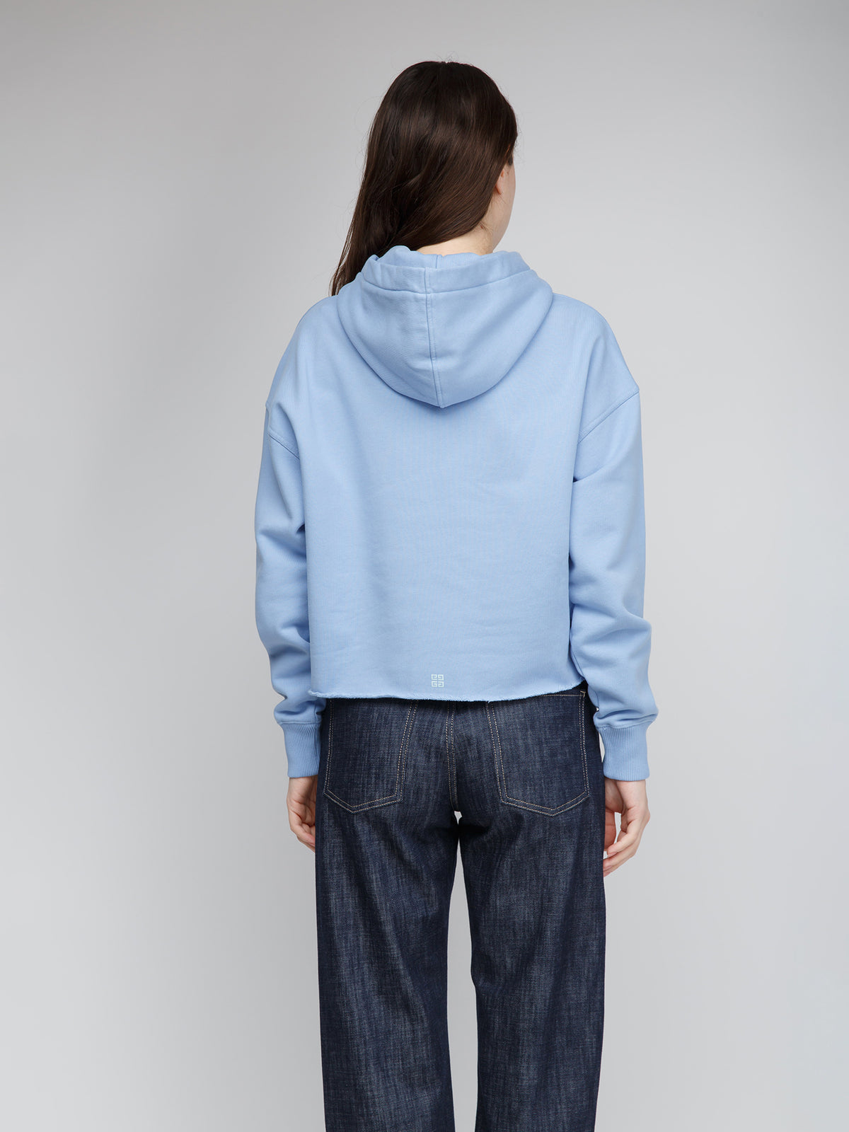 Sweatshirt Hoodie by Givenchy for women in cotton blue features an luminous silhouette, showcasing a sophisticated hooded neckline and for a truly luminous look.