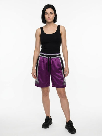Bermuda Shorts by Dolce & Gabbana for women in polyamide & polyester purple presents a sleek silhouette, featuring a sleek with a refined short and a sophisticated .