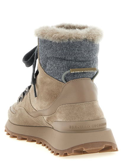 Flat Lace-Up Ankle Strap Winter Boots by Brunello Cucinelli for women in suede calf leather felt & rubber beige & gray features an effortless chic silhouette from the Women's Suede Calf Leather Felt & Rubber Flat Lace-Up Ankle Strap Winter Boots collection, showcasing a effortless chic flat and refined for an effortless chic look.