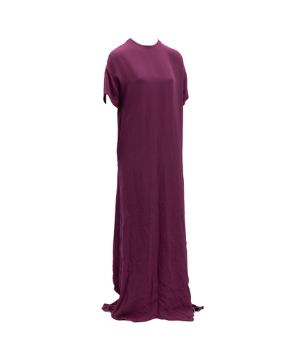 Dress by Valentino Garavani for women in silk burgundy features a dramatic silhouette, showcasing an elegant keyhole neckline and that flows into a dramatic maxi short long.