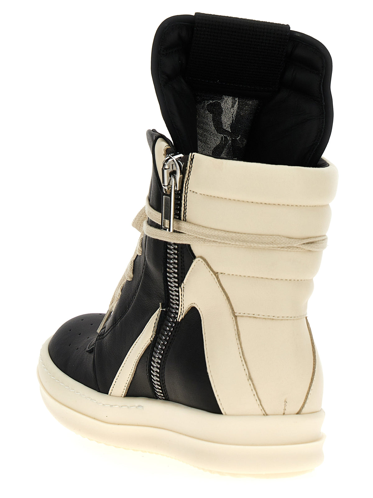 Sneakers by Rick Owens for women in bos taurus calfskin leather bicolour, black & white presents a on trend silhouette from the Women's High Top Bos Taurus Calfskin Leather Sneakers collection, showcasing a on trend high-top style for an elevated aesthetic.