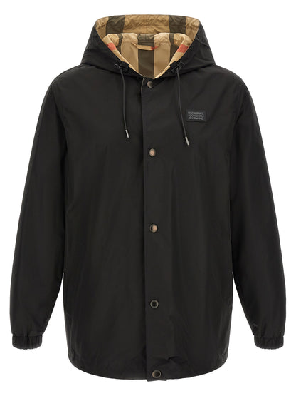 Hooded Overcoat by Burberry for men in polyester black & print features a cosy chic silhouette, artfully detailed with a sophisticated hooded neckline and premium pockets & hooded for a cosy chic finish.