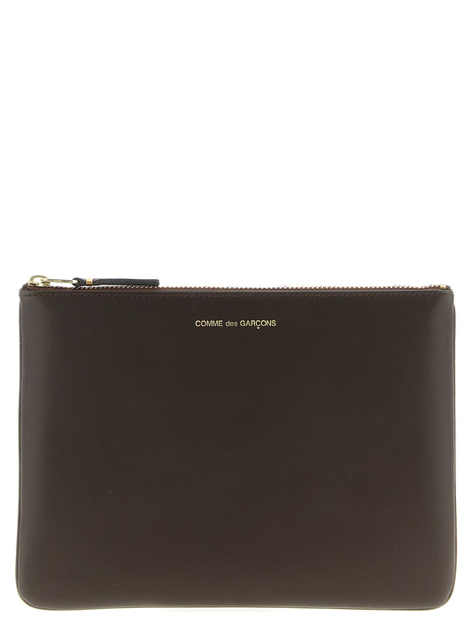 Cardholder Card Case by Comme Des Garçons for unisex in cowhide leather brown features a sleek silhouette, showcasing the sleek design of the Arecalf Cowhide Leather Cardholder Card Case with functional card-organization for a premium look.