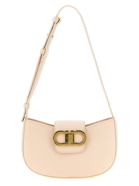 Shoulder Flap Bag by Ferragamo for women in calfskin leather multicolor & pink features a effortless chic silhouette with a secure flap & zipper, ample , and versatile shoulder-strap & adjustable-strap for a effortless chic finish.