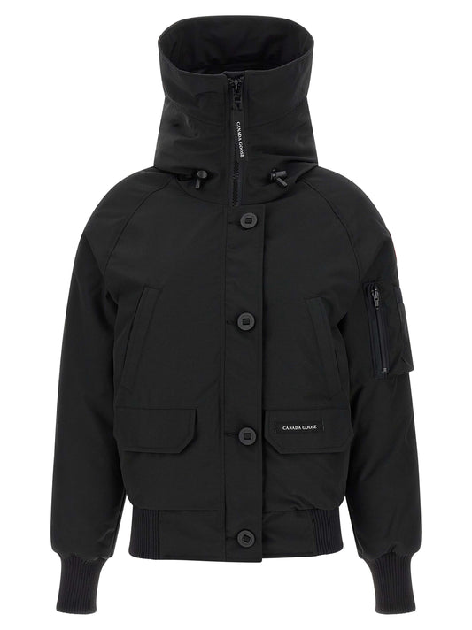 Hooded Bomber Jacket by Canada Goose for women in cotton polyester black showcases a bohemian silhouette, artfully detailed with a bohemian hooded neckline and signature pockets, hooded & insulated for a truly bohemian finish.