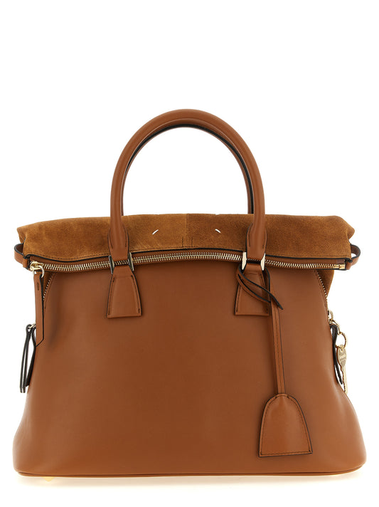 Medium Shoulder Bag by Maison Margiela for women in suede calfskin leather brown & gold features a distinguished silhouette, showcasing a secure and distinguished with versatile shoulder-strap, adjustable-strap & handle for a distinguished finish.