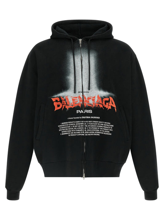 Sweatshirt Hoodie by Balenciaga for men in cotton black & print showcases a city-ready silhouette, artfully detailed with a signature hooded neckline and for a city-ready finish.