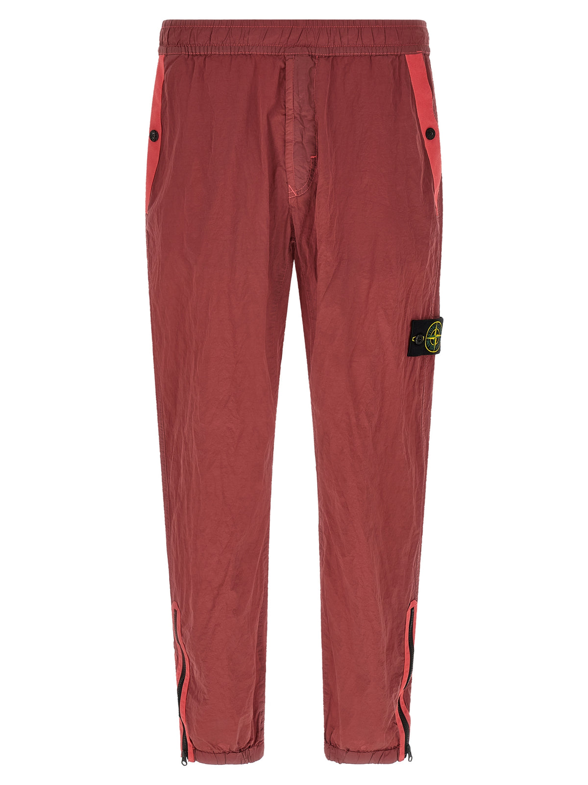 Joggers by Stone Island for men in nylon red features an sartorial regular-fit and long with a cut for a sartorial finish.