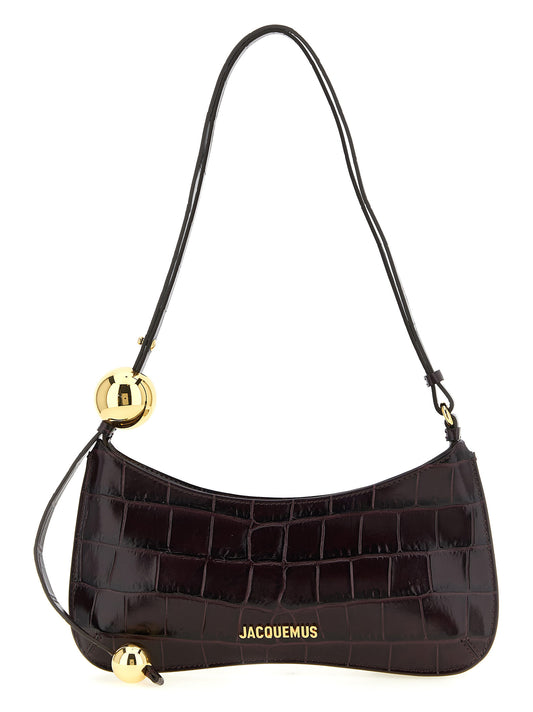Shoulder Bag by Jacquemus for women in canvas crocodile & calf leather bordeaux, gold & print features a enviable silhouette, showcasing a secure zipper, ample , and enviable shoulder-strap & adjustable-strap for a enviable finish.