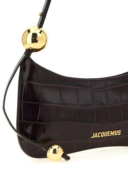 Shoulder Bag by Jacquemus for women in canvas crocodile & calf leather bordeaux, gold & print presents a versatile silhouette, showcasing a secure zipper and versatile with versatile shoulder-strap & adjustable-strap for a sophisticated look.