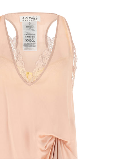 Dress by Maison Margiela for women in acetate lace & silk multicolor, pink, white & signature features a dramatic silhouette, showcasing an elegant v-neck neckline and that flows into a dramatic midi.