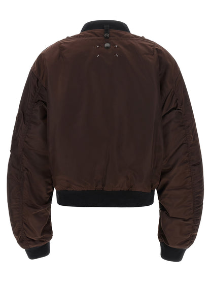 Bomber Jacket by Maison Margiela for women in modacrylic & polyamide black, brown & patterned showcases a bohemian silhouette, artfully detailed with a bohemian and signature pockets for a truly bohemian finish.