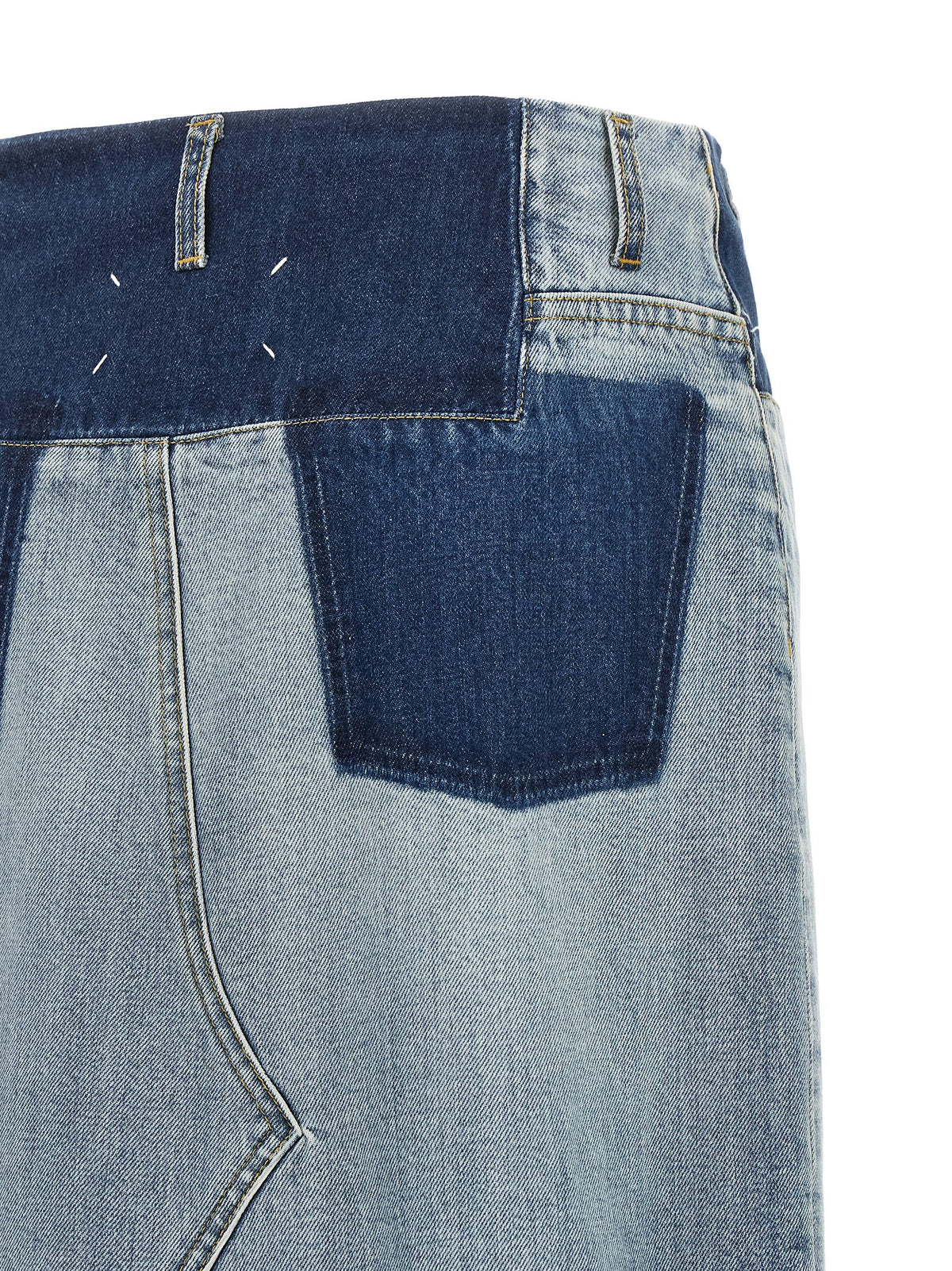 Skirt by Maison Margiela for women in denim cotton light-blue & signature showcases a dramatic silhouette, artfully capturing the essence of the Four Stitches Women's Denim Cotton Mini Skirt in a dramatic mini cut for a refined look.