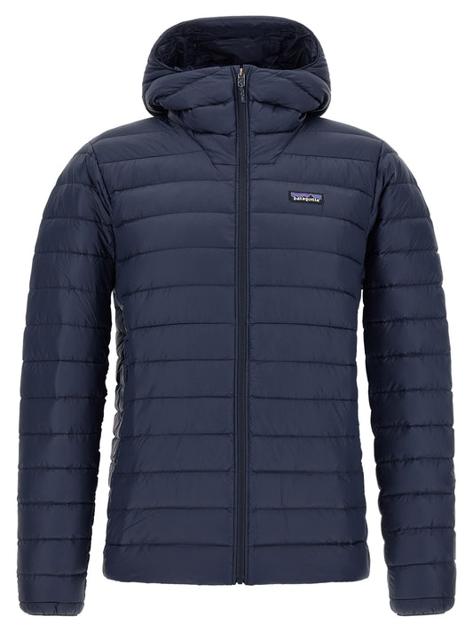 Hooded Puffer Jacket by PATAGONIA for men in nylon navy features a dramatic silhouette, showcasing a sophisticated hooded neckline and distinctive thermal, pockets, hooded & insulated for a dramatic aesthetic.