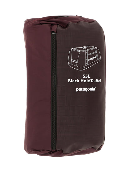 Travel Backpack by PATAGONIA for men in tu & polyester black & bordeaux features a utilitarian chic Black Hole TU & Polyester Travel Backpack design with a secure , ample , and versatile backpack-strap, adjustable-strap & handle for a utilitarian chic finish.
