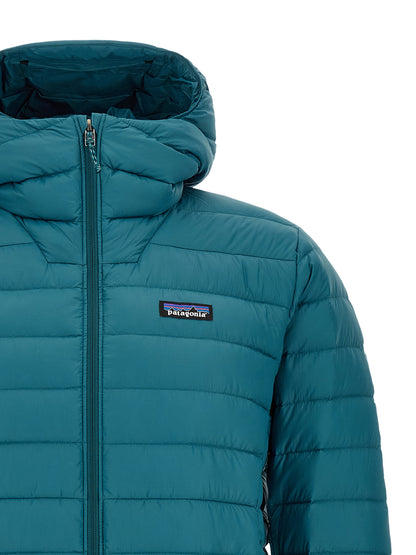 Hooded Puffer Jacket by PATAGONIA for men in nylon blue showcases a bohemian silhouette, artfully detailed with a bohemian hooded neckline and signature thermal, hooded & insulated for a truly bohemian finish.