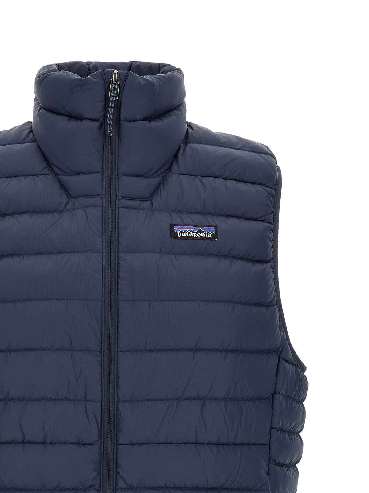 Vest by PATAGONIA for men in nylon fabric navy features an contemporary silhouette, showcasing refined windproof, pockets & insulated and a contemporary high-neck neckline for a sophisticated layered look.