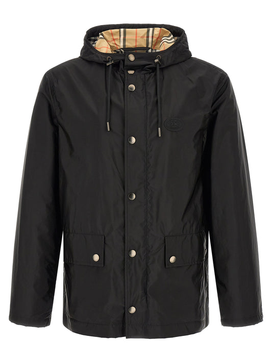 Hooded Windbreaker Jacket by Burberry for men in polyamide & silicone black showcases a urban chic silhouette, detailed with a urban chic hooded neckline and functional pockets, hooded & windproof for a polished finish.