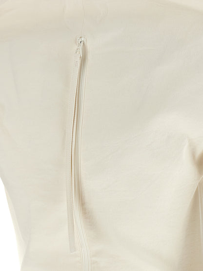 Blouse by Issey Miyake for women in cotton nylon polyester & polyurethane cream & white showcases a sublime silhouette, artfully detailed with a sublime and for a sophisticated, sublime finish.