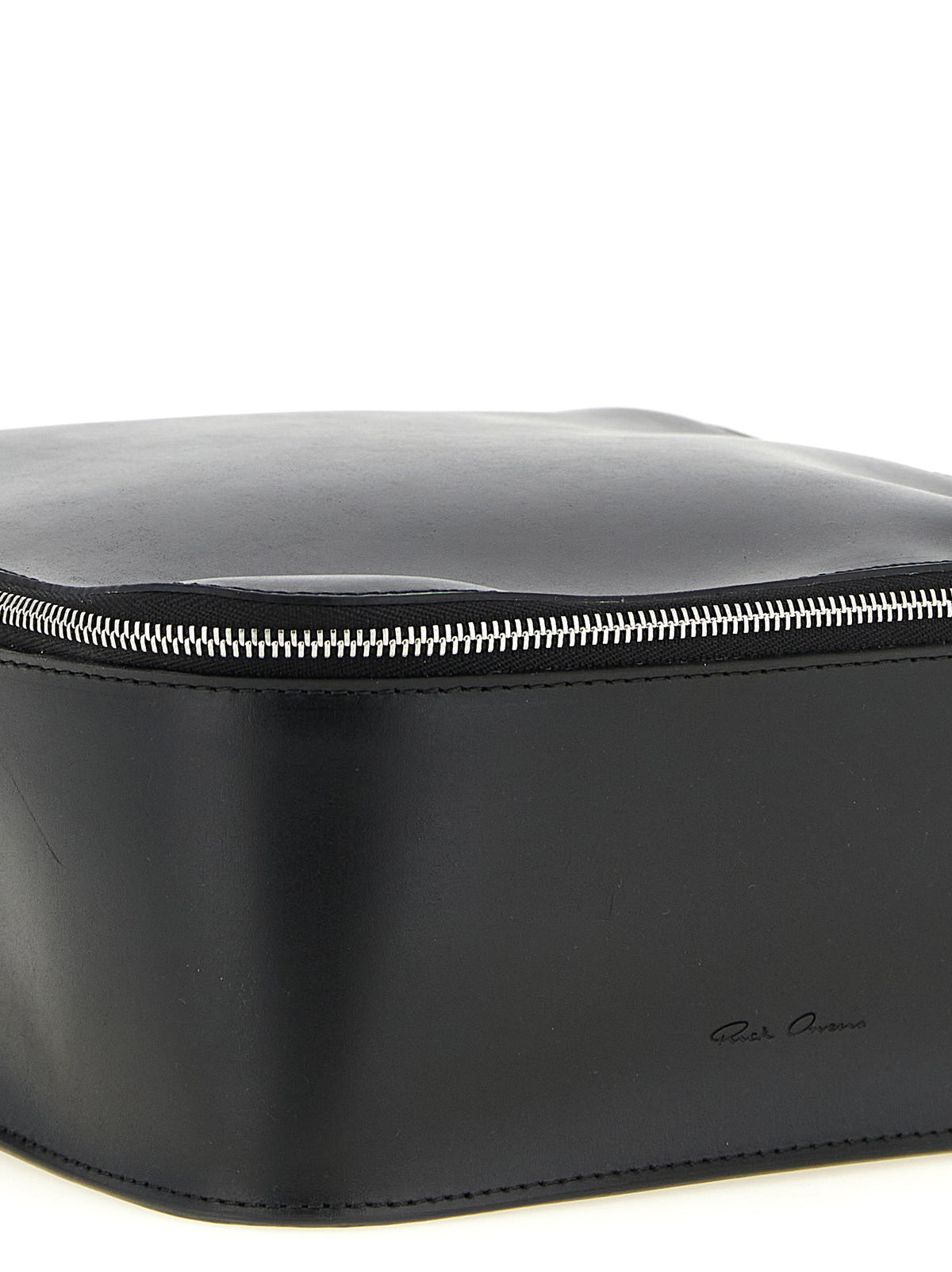 Travel Makeup Bag by Rick Owens for men in calfskin leather black & silver showcases a dramatic silhouette from the Calfskin Leather Travel Makeup Bag collection, detailed with a secure zipper, , and versatile handle.