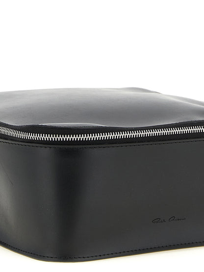 Travel Makeup Bag by Rick Owens for men in calfskin leather black & silver showcases a dramatic silhouette from the Calfskin Leather Travel Makeup Bag collection, detailed with a secure zipper, , and versatile handle.