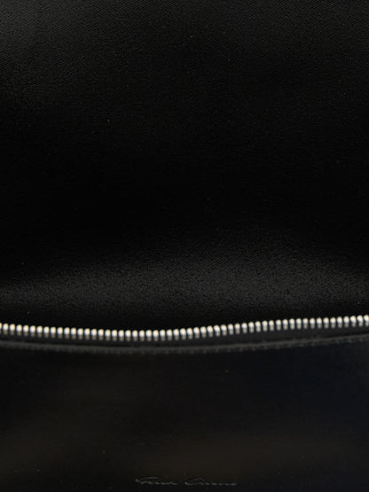 Earbuds Carrying Case by Rick Owens for men in polyester wool and black & silver showcases a sleek silhouette, elegantly protecting Calfskin Leather Earbuds Carrying Case with a sleek design.