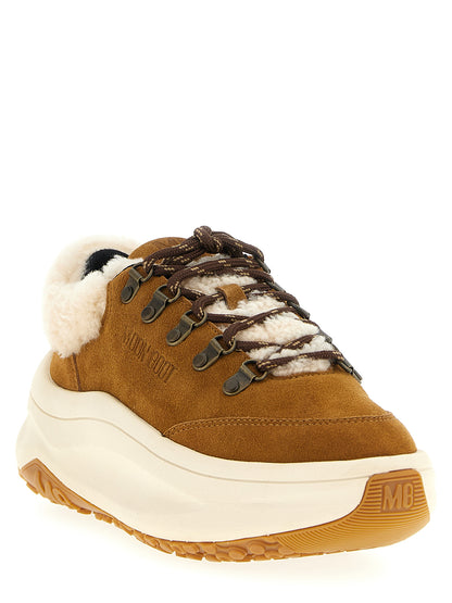 Sneakers by Moon Boot for women in eva polyester rubber & suede leather beige presents a sumptuous silhouette, artfully capturing the essence of the City Women's Chunky EVA Polyester Rubber & Suede Leather Sneakers with its sumptuous chunky style design.