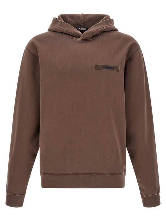 Sweatshirt Hoodie by Jacquemus for men in cotton brown features an luminous silhouette, showcasing a sophisticated hooded neckline and for a truly luminous look.