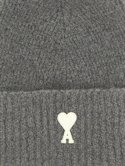 Beanie Hat by Ami Paris for unisex in polyamide leather & alpaca wool gray features a refined silhouette, showcasing the refined design of the Polyamide Leather & Alpaca Wool Beanie Hat for a sophisticated look.
