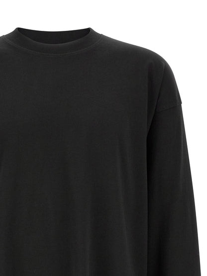 T-Shirt by Dries Van Noten for men in cotton black showcases a unassuming silhouette, artfully detailed with a refined crew neckline and unassuming for a sophisticated, contemporary look.