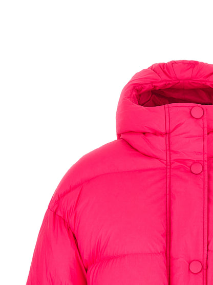 Hooded Puffer Jacket by IENKI IENKI for women in nylon fabric fuchsia features a dramatic silhouette, showcasing a sophisticated hooded neckline and distinctive windproof, pockets, hooded & insulated for a dramatic aesthetic.