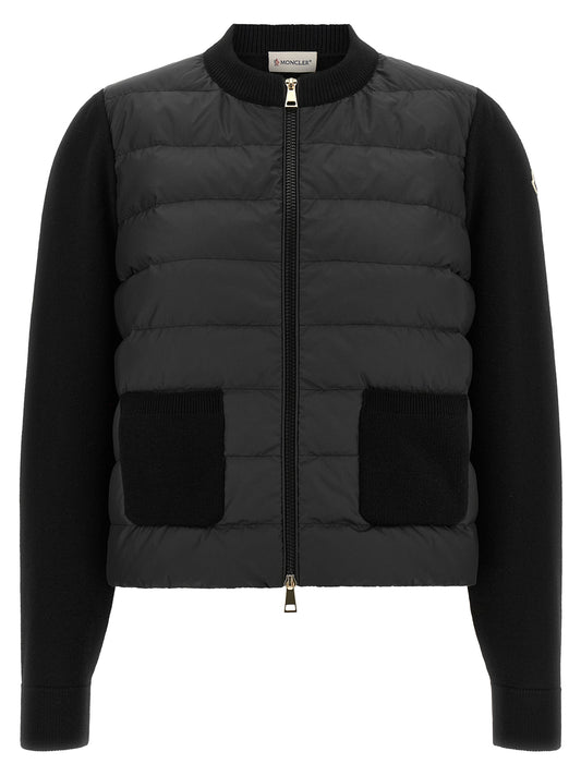 Cardigan by Moncler for women in virgin wool & polyester black features a dramatic silhouette, showcasing a sophisticated and dramatic detail for a timeless, premium look.