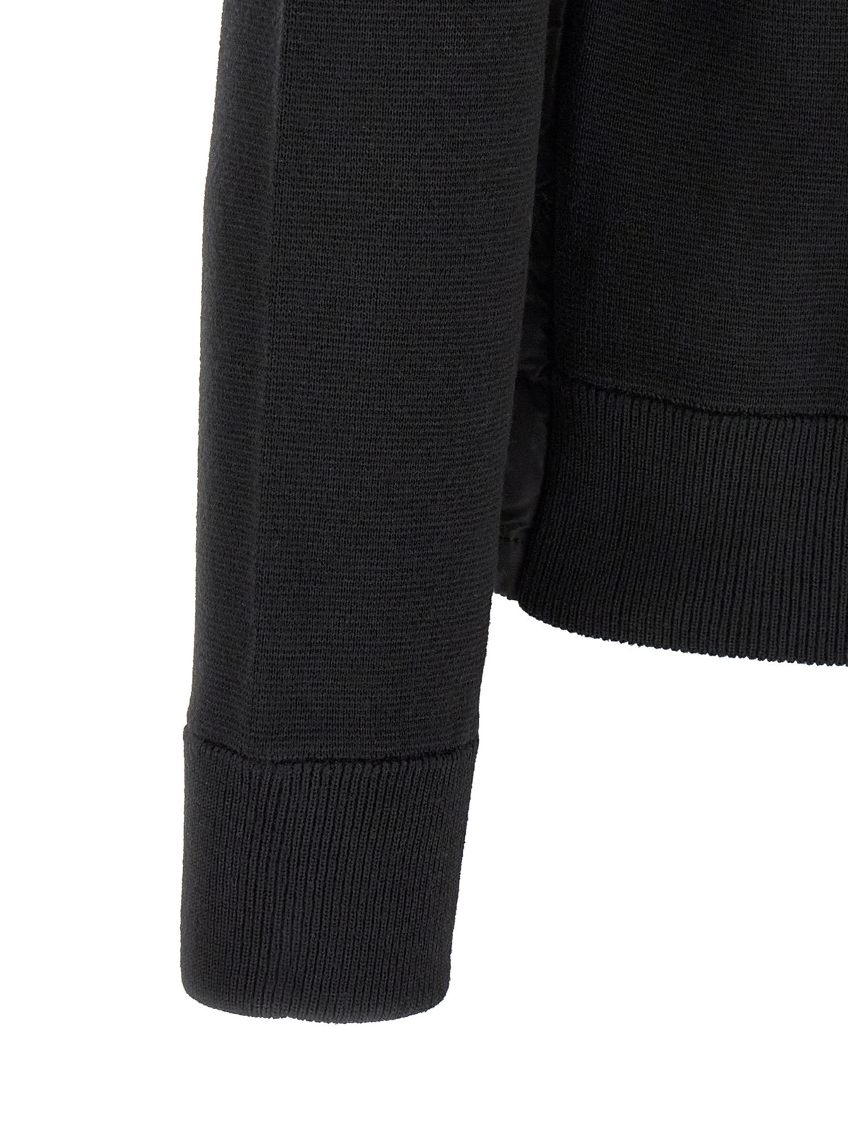 Cardigan by Moncler for men in virgin wool & polyamide black presents a textural silhouette, artfully finished with a textural high-neck neckline and for a sophisticated, textural look.