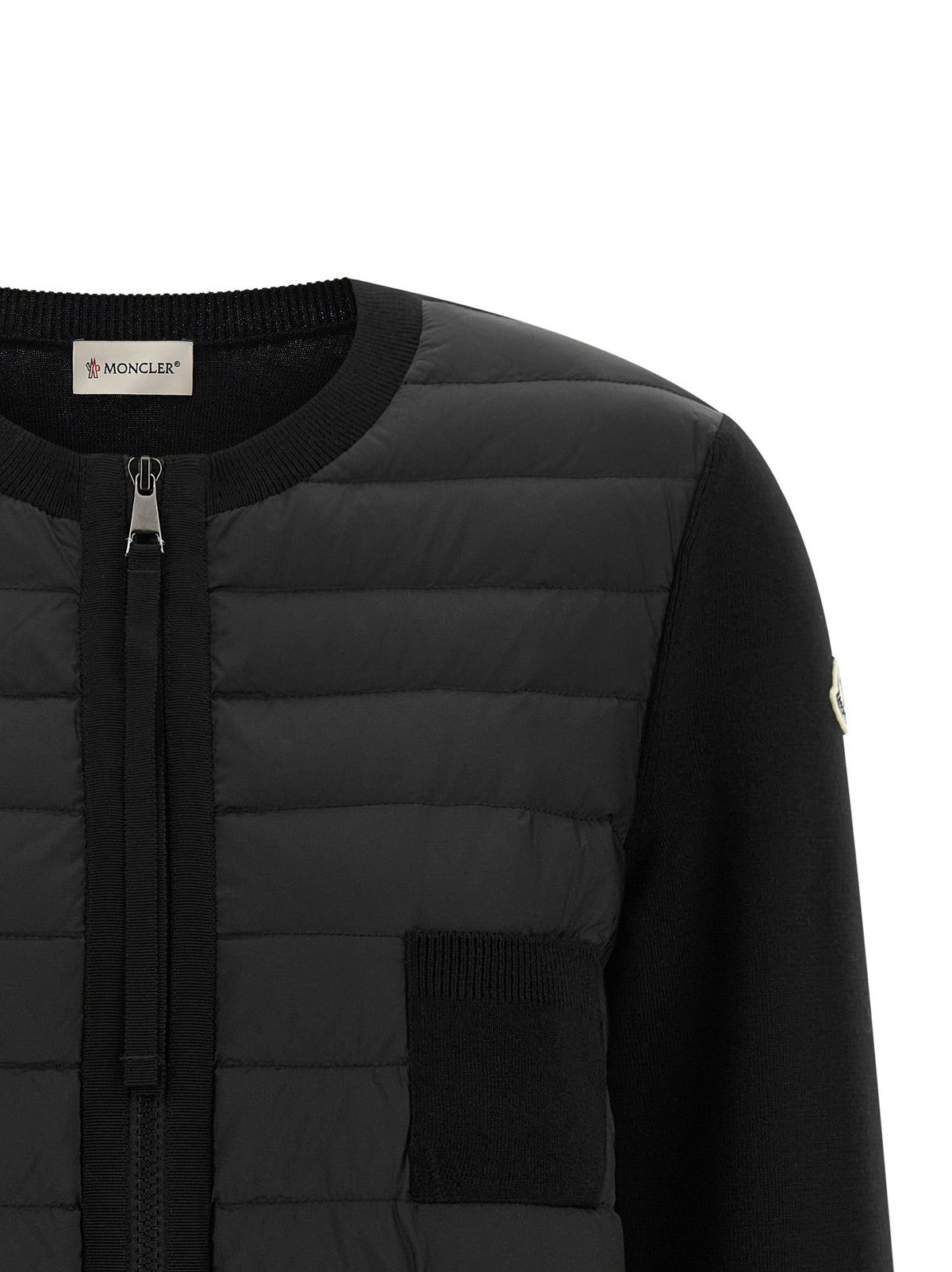 Cardigan by Moncler for women in felt polyamide & merino wool black & signature features an impeccable silhouette, showcasing a sophisticated and detail for a truly impeccable finish.
