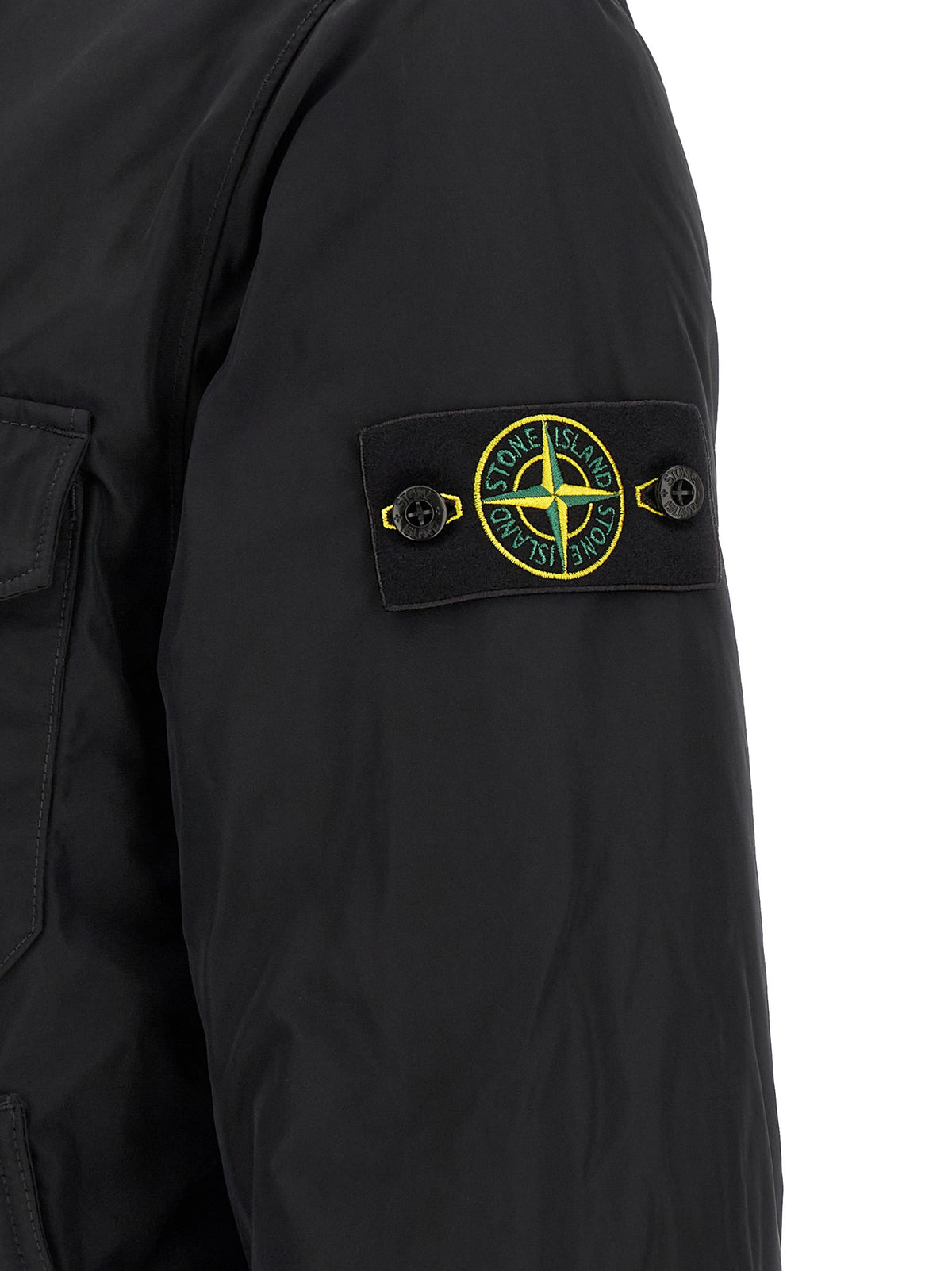 Jacket by Stone Island for men in polyamide & polyester black & signature presents a authentic silhouette, artfully detailed with a authentic and functional thermal & pockets for a premium authentic finish.